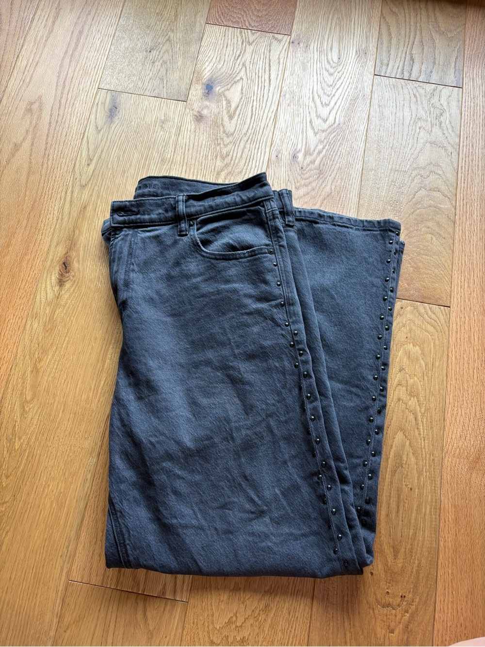 American Eagle Outfitters Women's Black Straight Jeans with Stud Detail.
